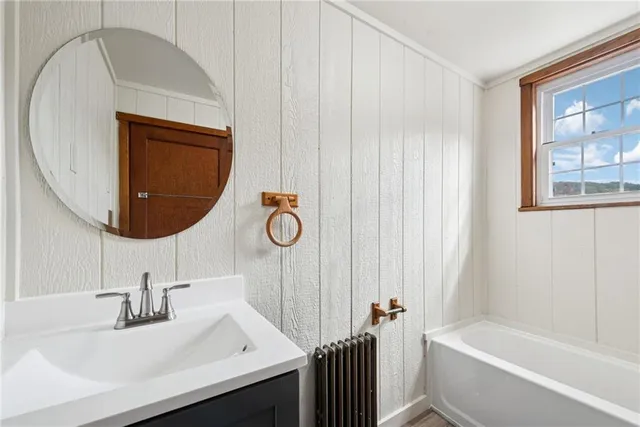 a view of a patio with table and chairs