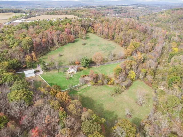 a view of lake with green space