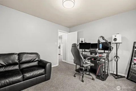 a view of workspace with lounge chair