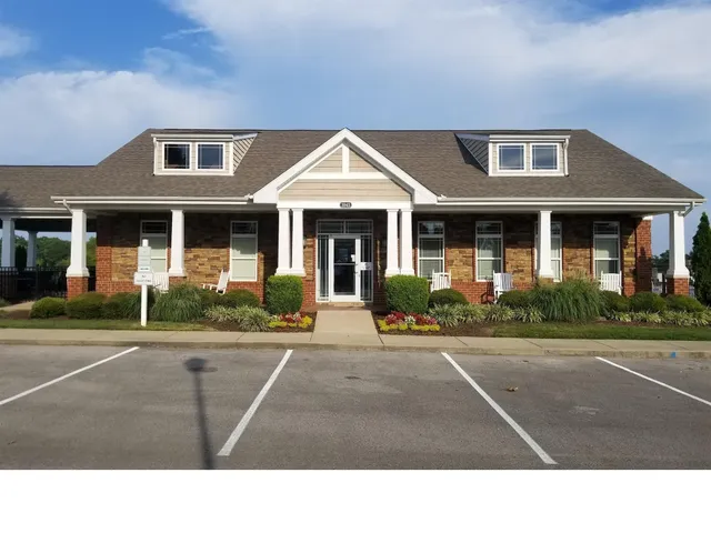 a black and white house with a outdoor space