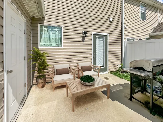 a outdoor space with furniture and lounge chair