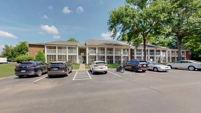a view of front door and yard