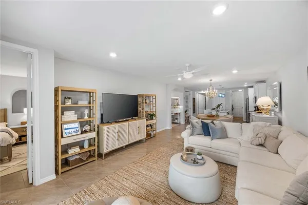 a kitchen with a table and chairs in it