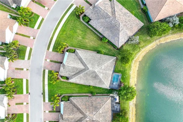 an aerial view of a city with lawn chairs