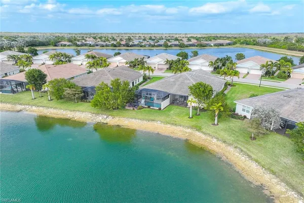 front view of a building with a garden