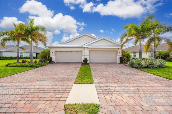 an aerial view of residential houses with outdoor space swimming pool and mountain view