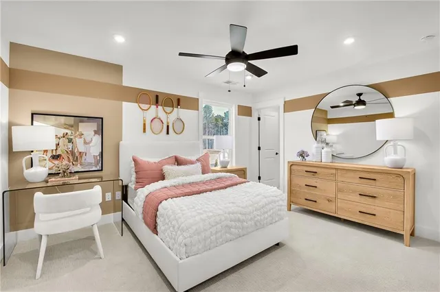 a bedroom with a bed and cabinets