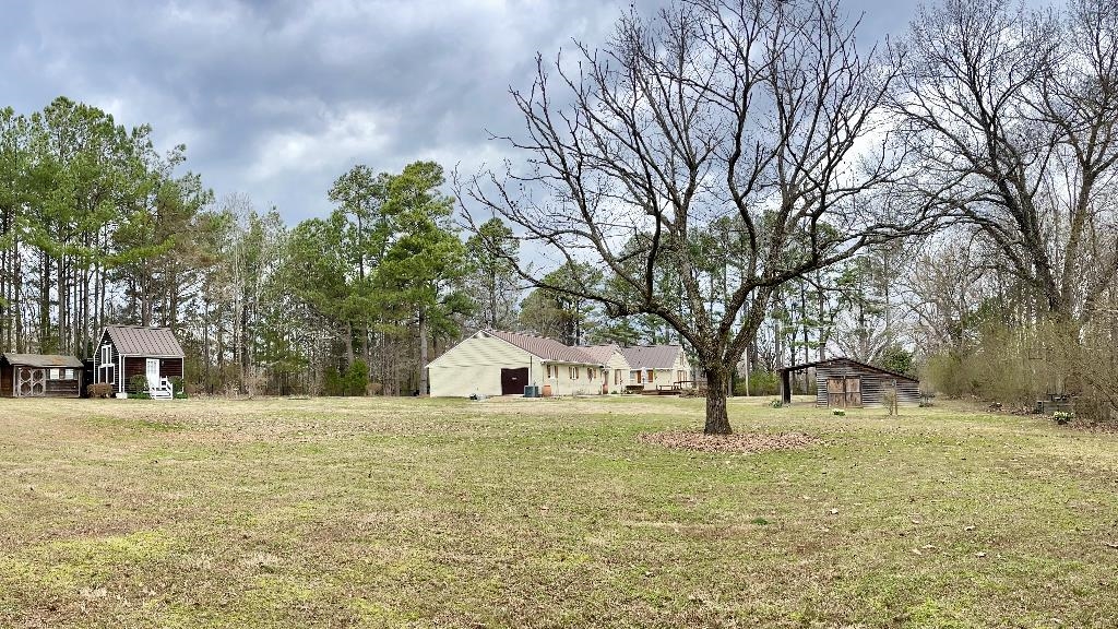 11425 Macon Road Eads, TN 38028 - Photo 4 of 11 a view of white house with a yard