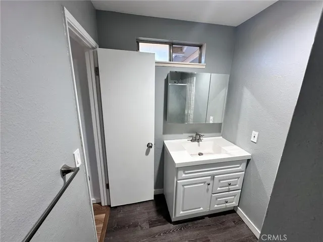 a bathroom with a sink toilet and tub