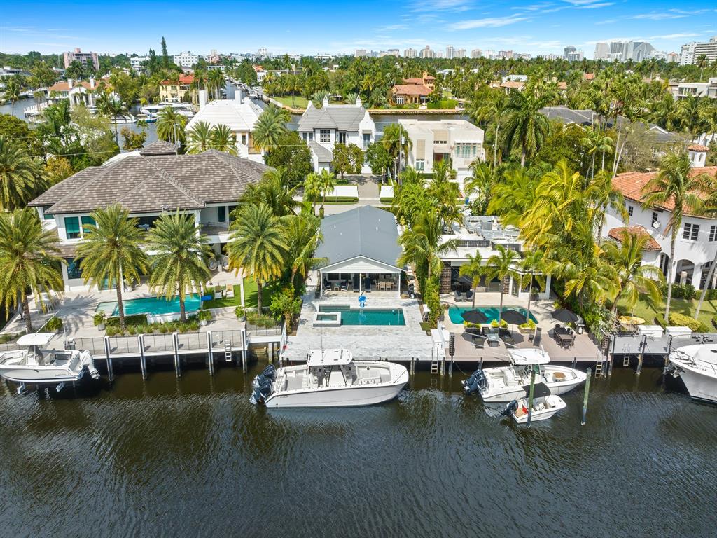 1758 Southeast 7th Street Fort Lauderdale, FL 33316 - Photo 7 of 19 a view of a lake with lawn chairs
