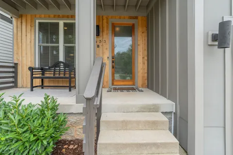 a front view of a house with a porch