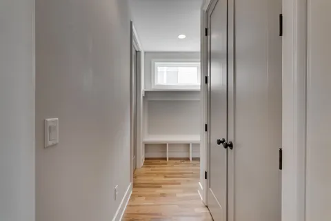 a view of a bathroom from the hallway
