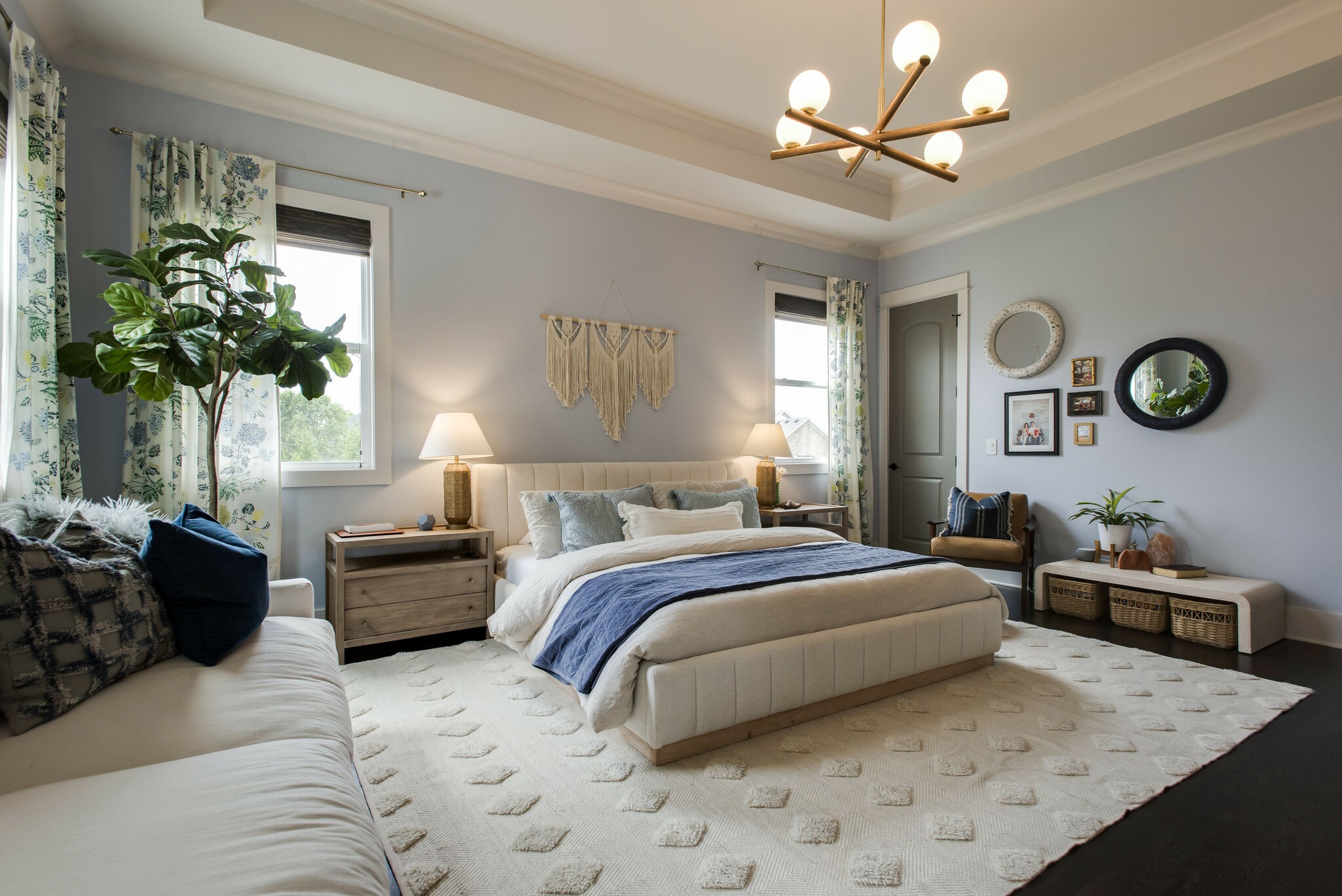 121 Princess Circle Franklin, TN 37064 - Photo 19 of 38 a spacious bedroom with a bed a chandelier potted plant on the dresser and a chandelier