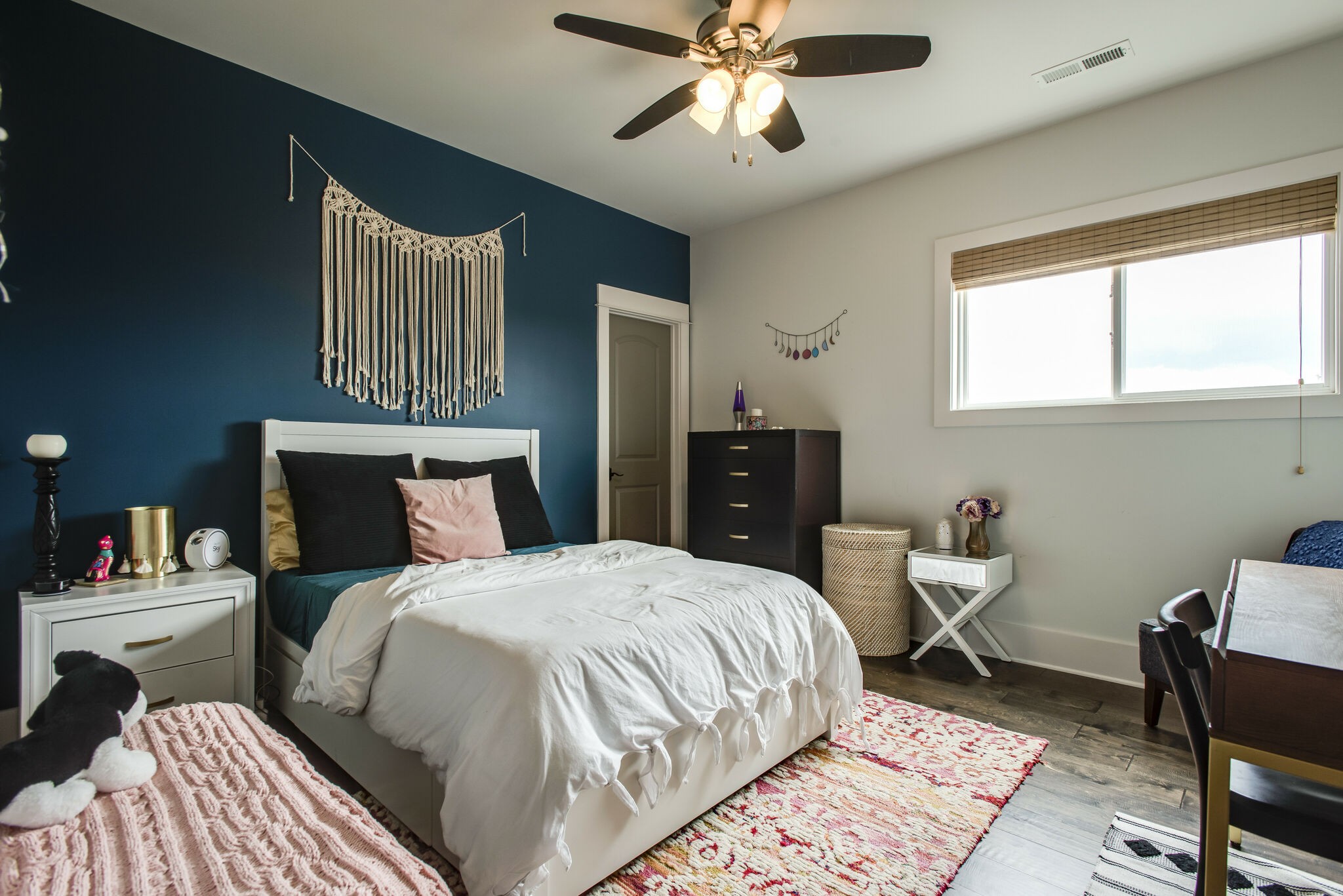 121 Princess Circle Franklin, TN 37064 - Photo 25 of 38 a bedroom with a bed and a chandelier