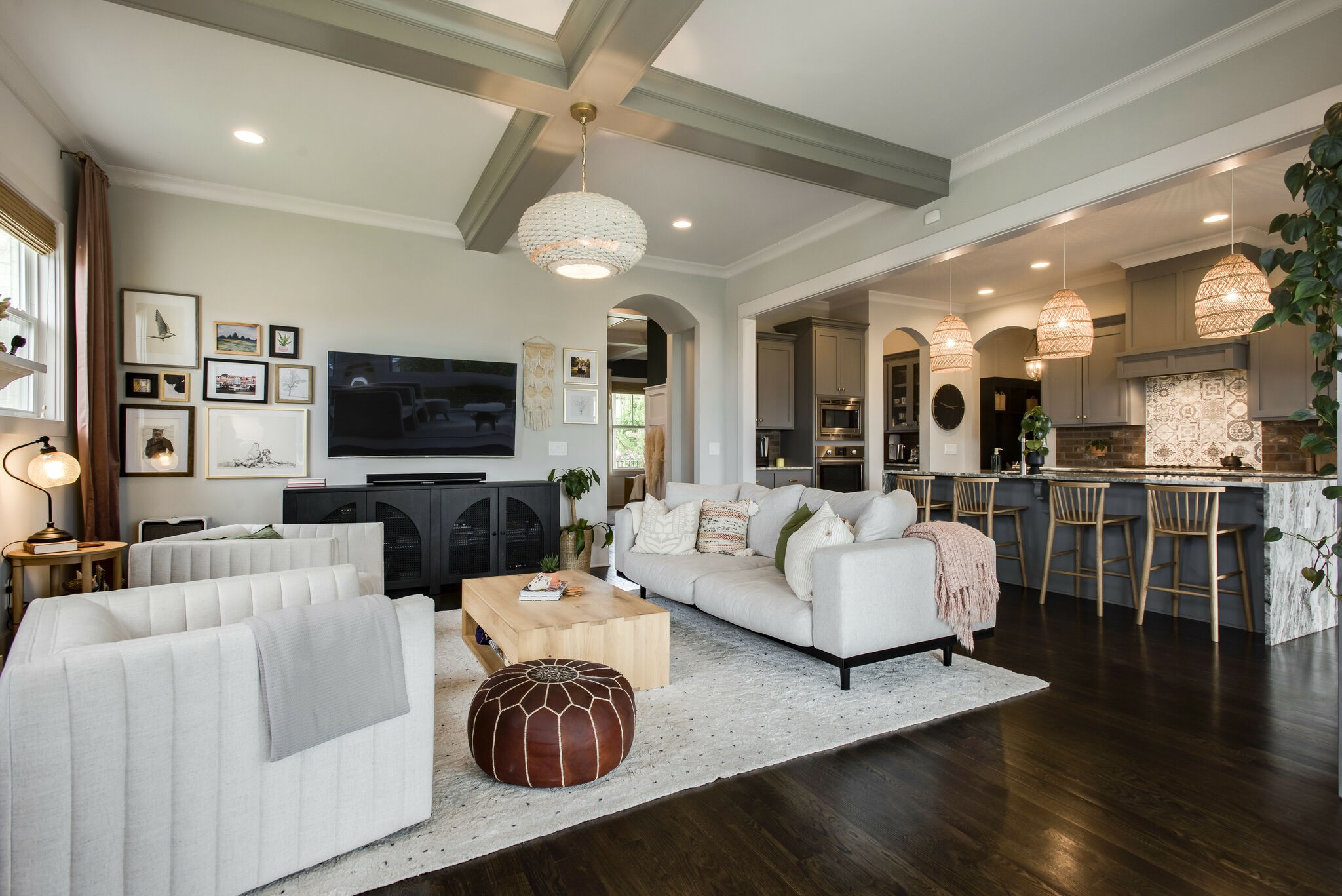 121 Princess Circle Franklin, TN 37064 - Photo 9 of 38 a living room with furniture a flat screen tv and kitchen view