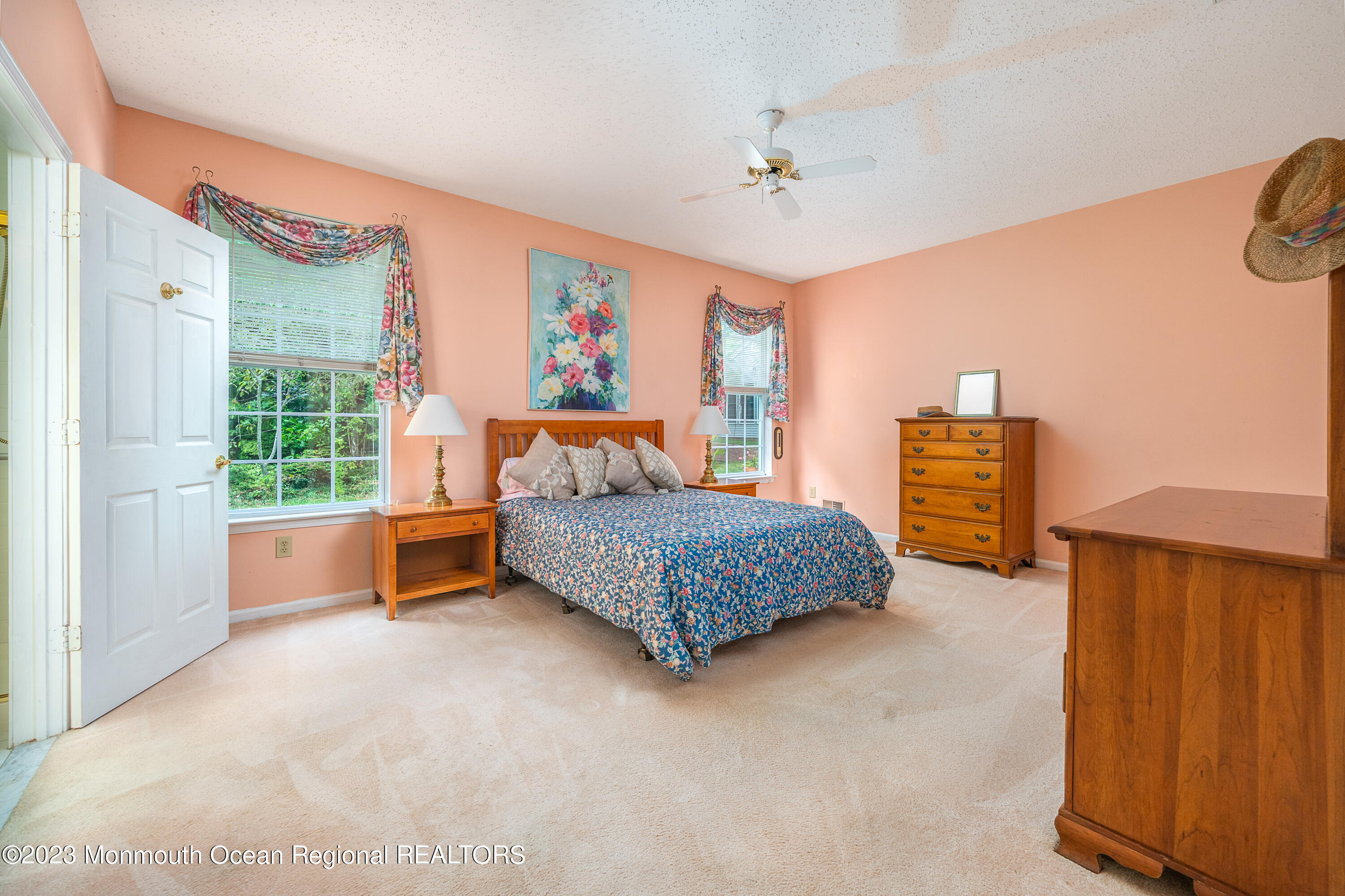44 Sandpiper Road Barnegat, NJ 08005 - Photo 15 of 27 a bedroom with a bed and wooden floor