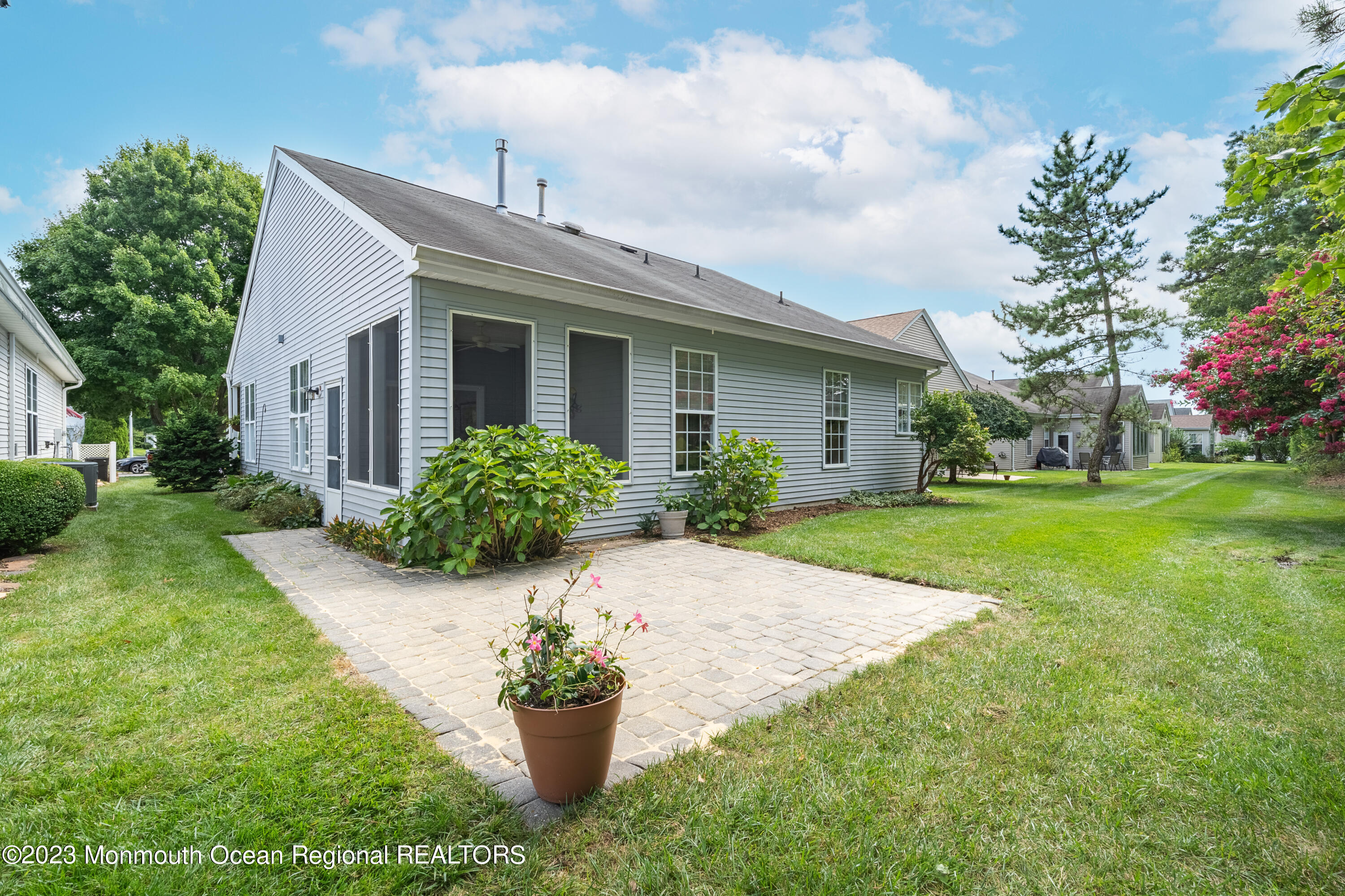 44 Sandpiper Road Barnegat, NJ 08005 - Photo 19 of 27 a front view of house with yard and green space