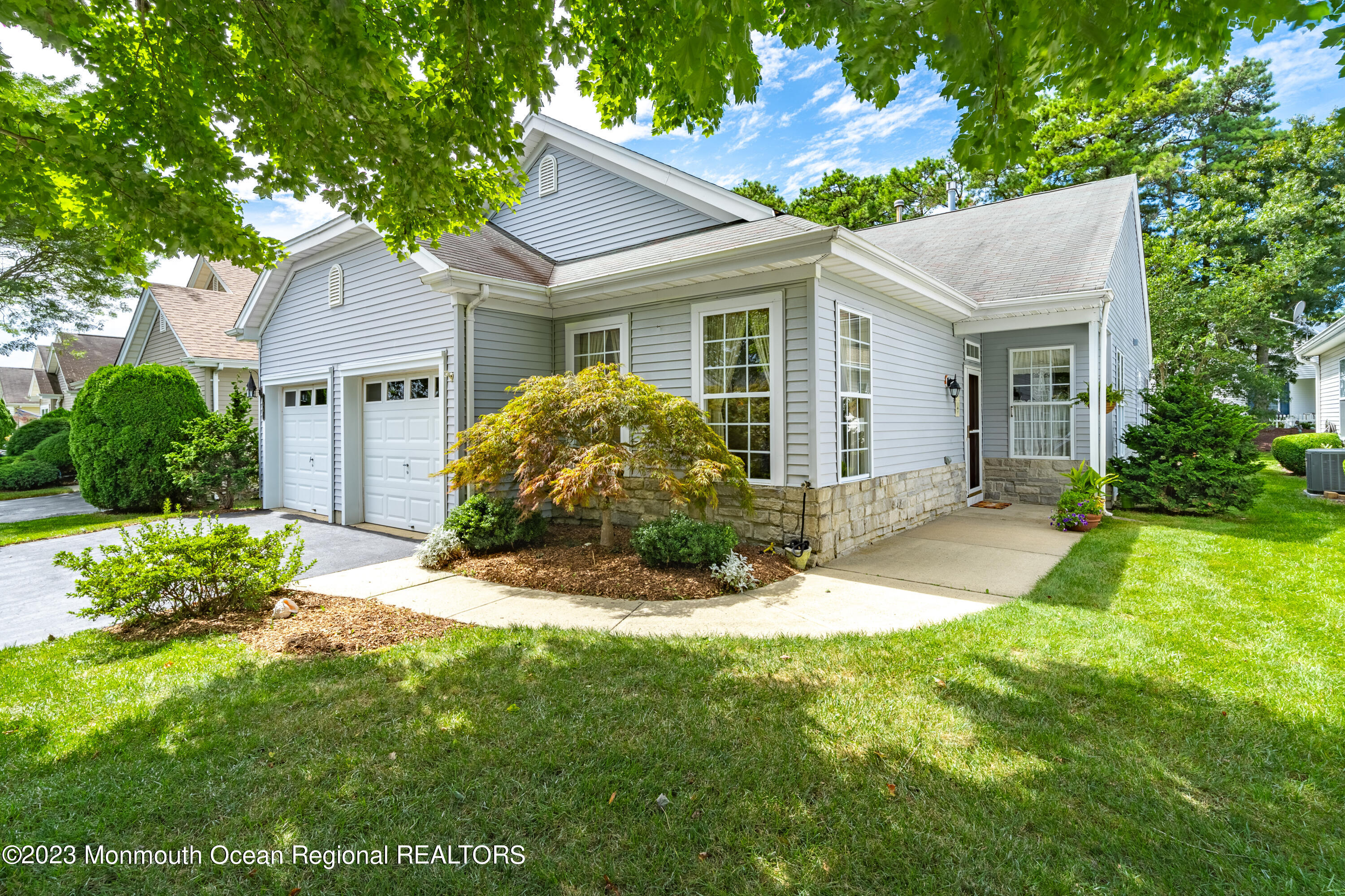 44 Sandpiper Road Barnegat, NJ 08005 - Photo 2 of 27 a view of a house with a yard and potted plants