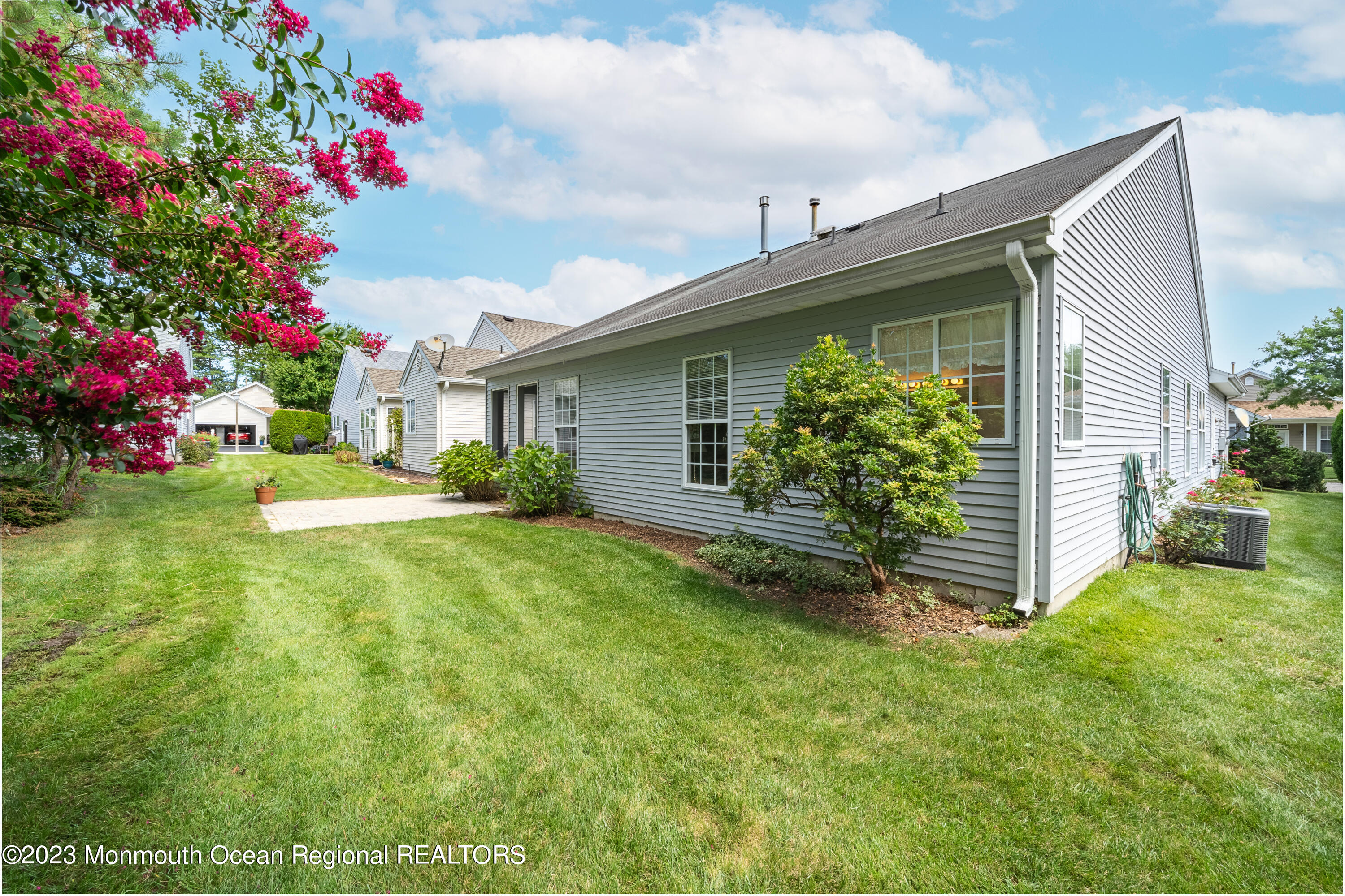 44 Sandpiper Road Barnegat, NJ 08005 - Photo 21 of 27 a front view of a house with garden