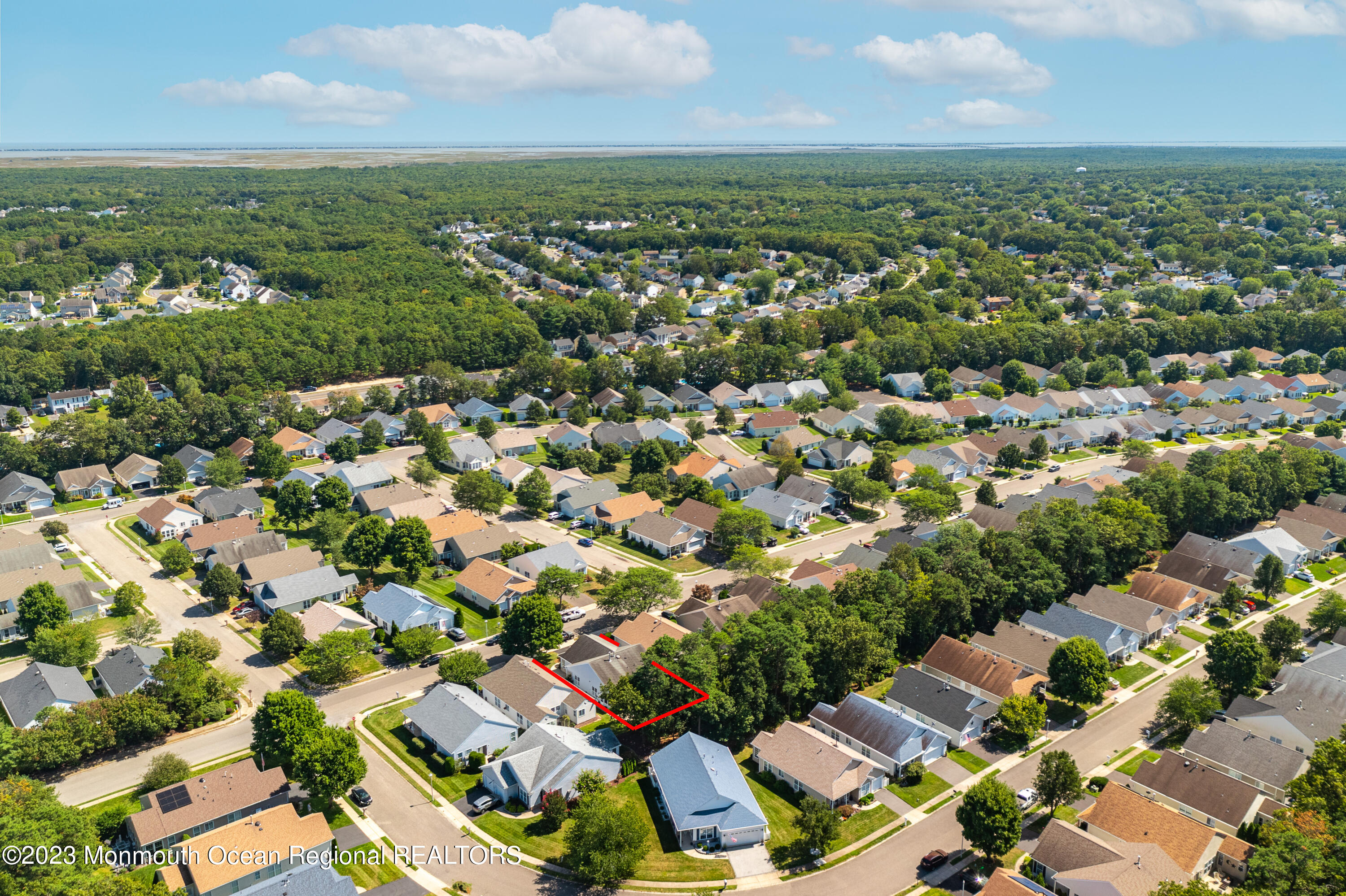 44 Sandpiper Road Barnegat, NJ 08005 - Photo 27 of 27 an aerial view of residential houses with outdoor space and trees