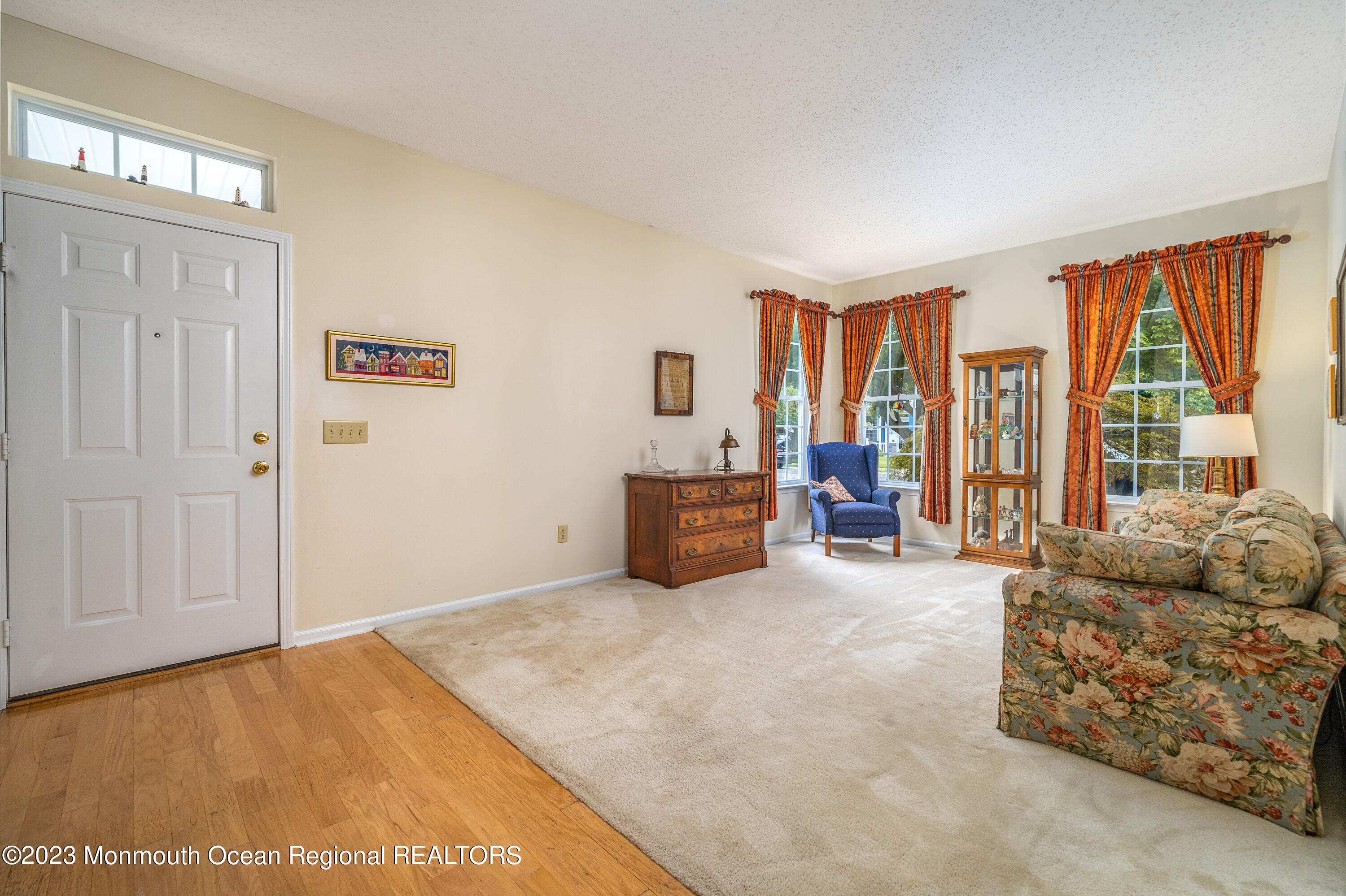 44 Sandpiper Road Barnegat, NJ 08005 - Photo 5 of 27 a living room with furniture and a large window