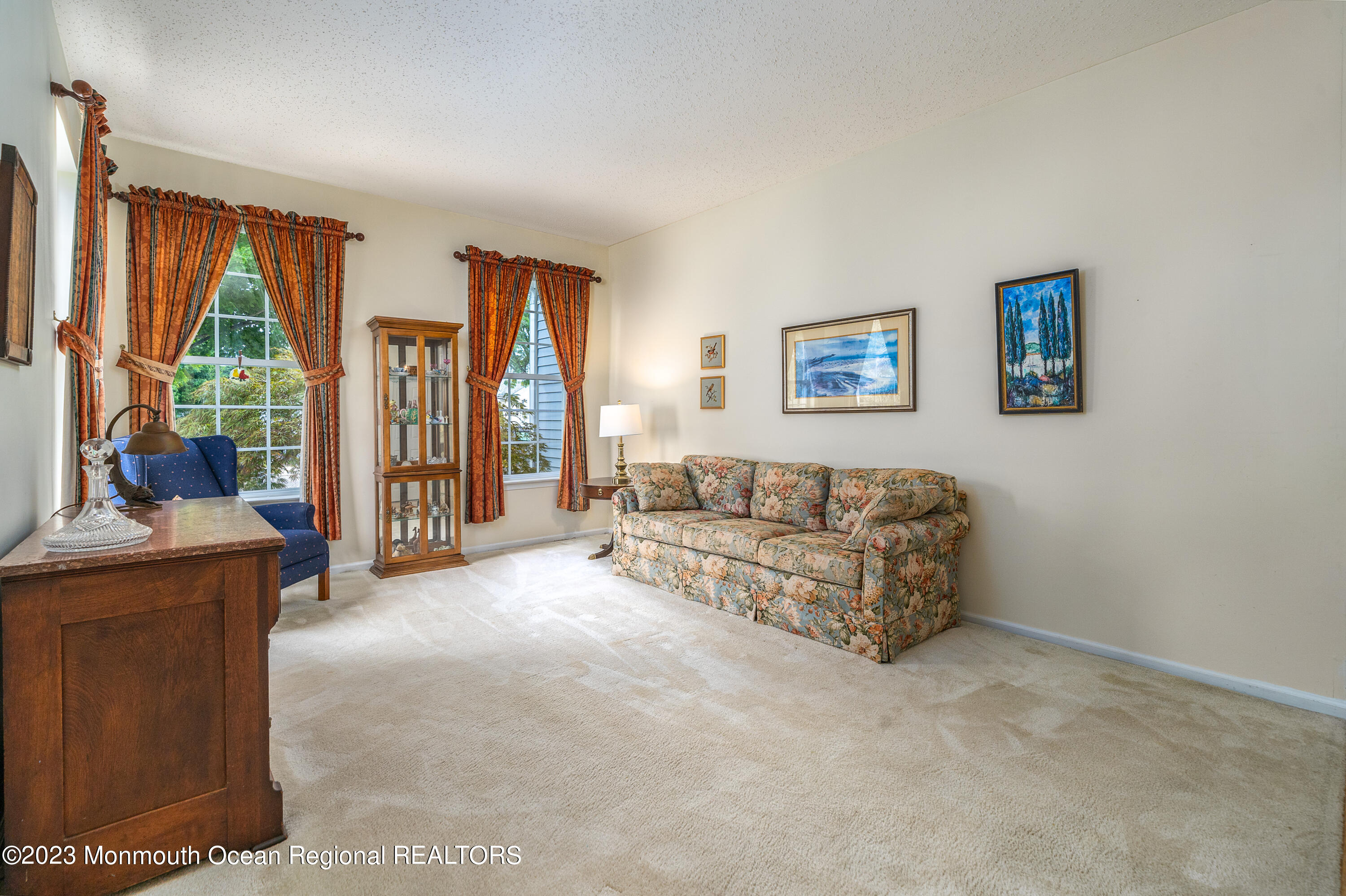 44 Sandpiper Road Barnegat, NJ 08005 - Photo 6 of 27 a living room with furniture and a large window