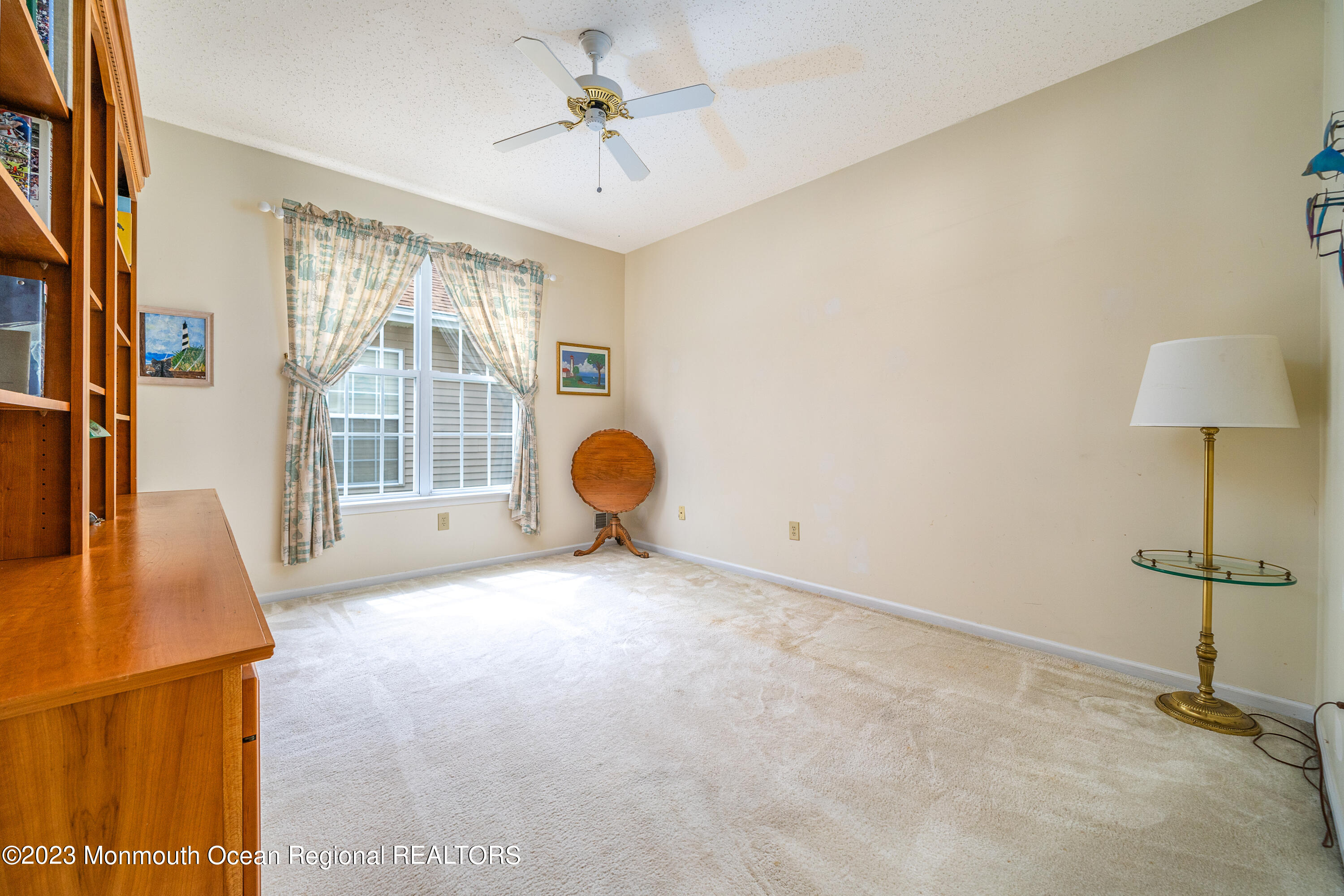 44 Sandpiper Road Barnegat, NJ 08005 - Photo 7 of 27 a view of a room with a window and a ceiling fan