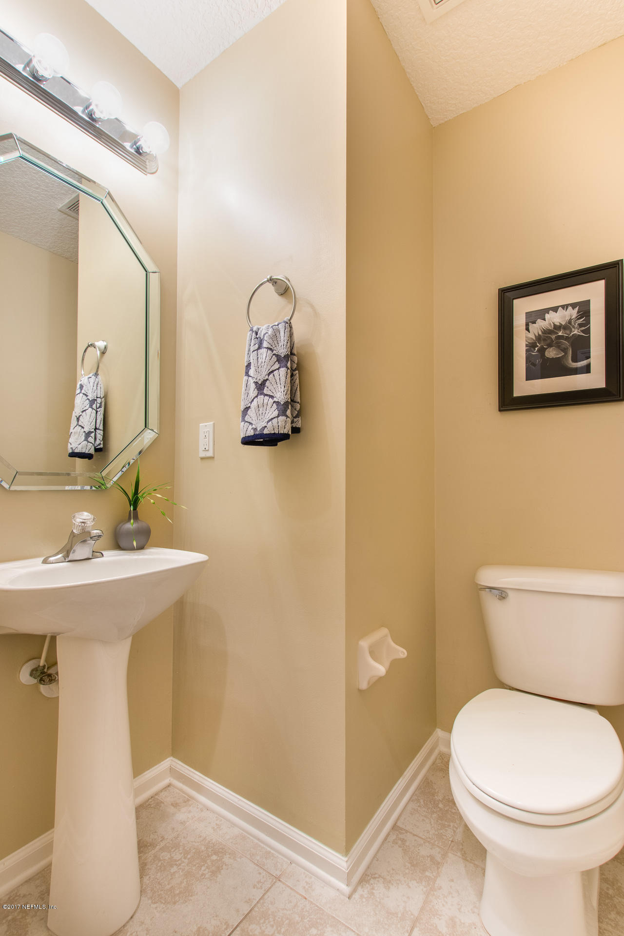 11855 Templeton Road Jacksonville, FL 32258 - Photo 12 of 23 a bathroom with a toilet sink and mirror