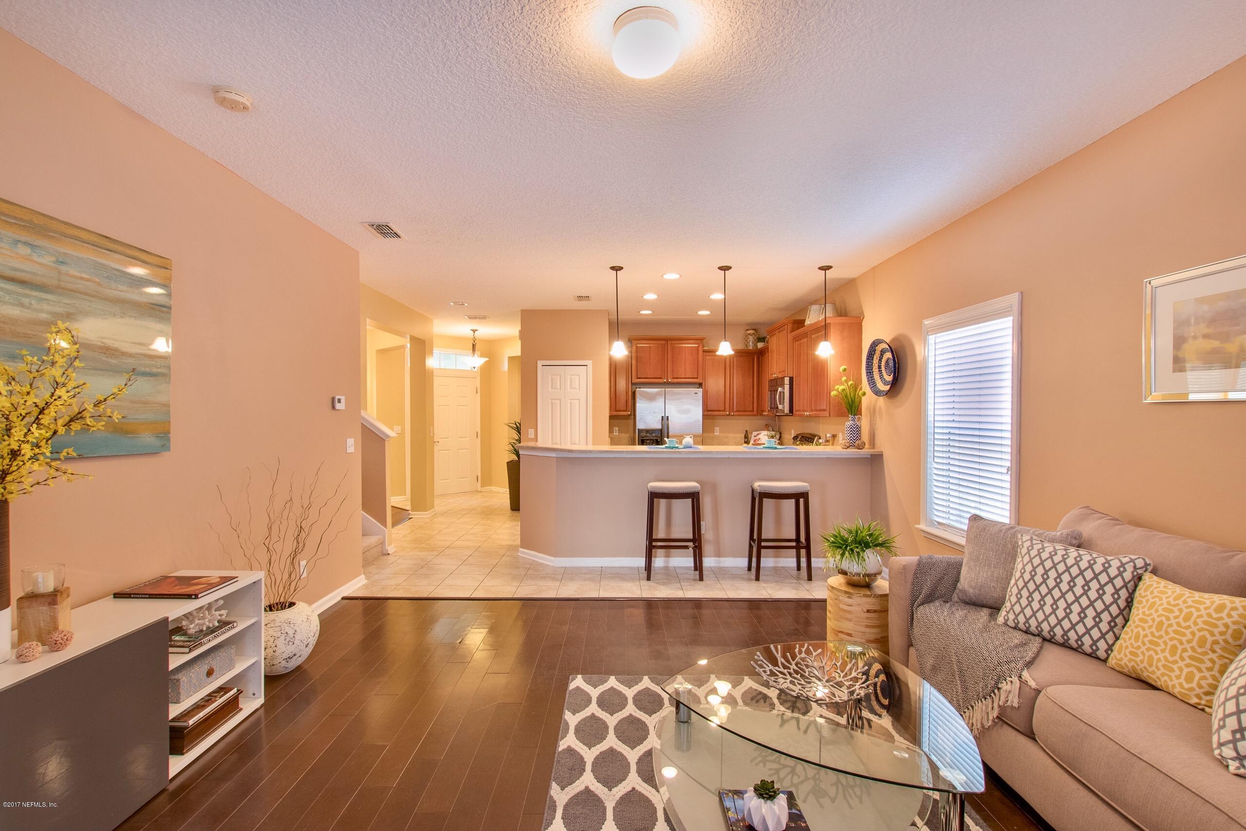 11855 Templeton Road Jacksonville, FL 32258 - Photo 5 of 23 a living room with furniture and a couch