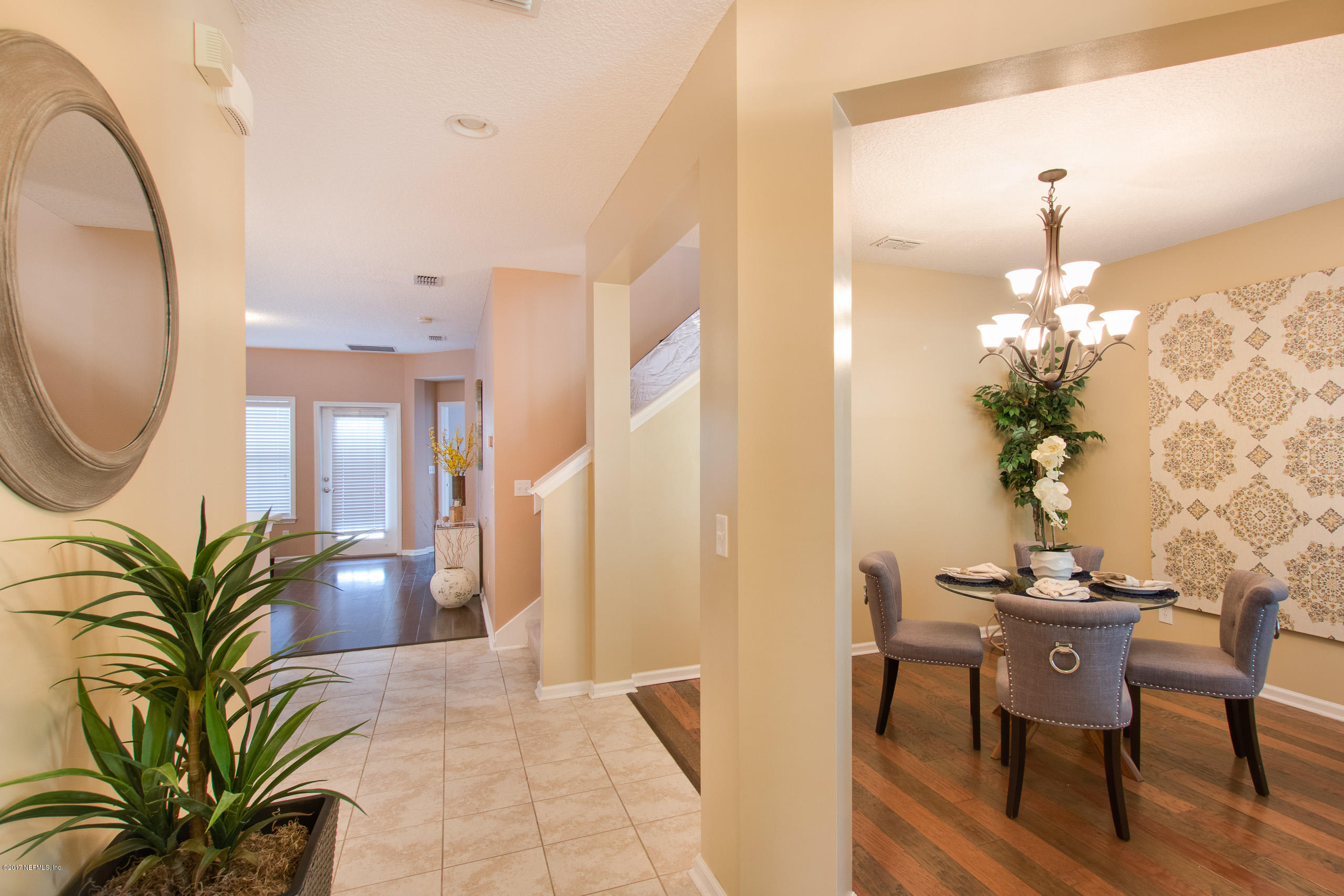 11855 Templeton Road Jacksonville, FL 32258 - Photo 6 of 23 a view of a livingroom with furniture and a potted plant