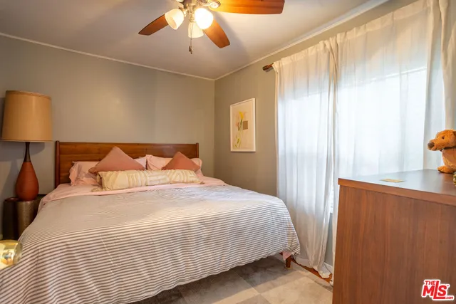 a room with furniture and a mirror