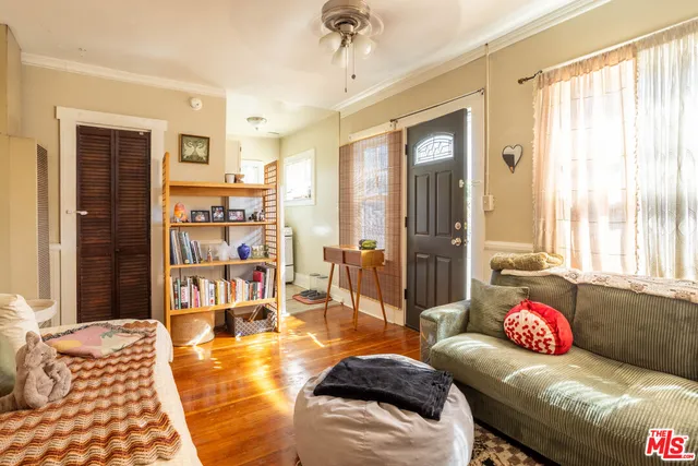 a outdoor sitting area with a couch and a fireplace