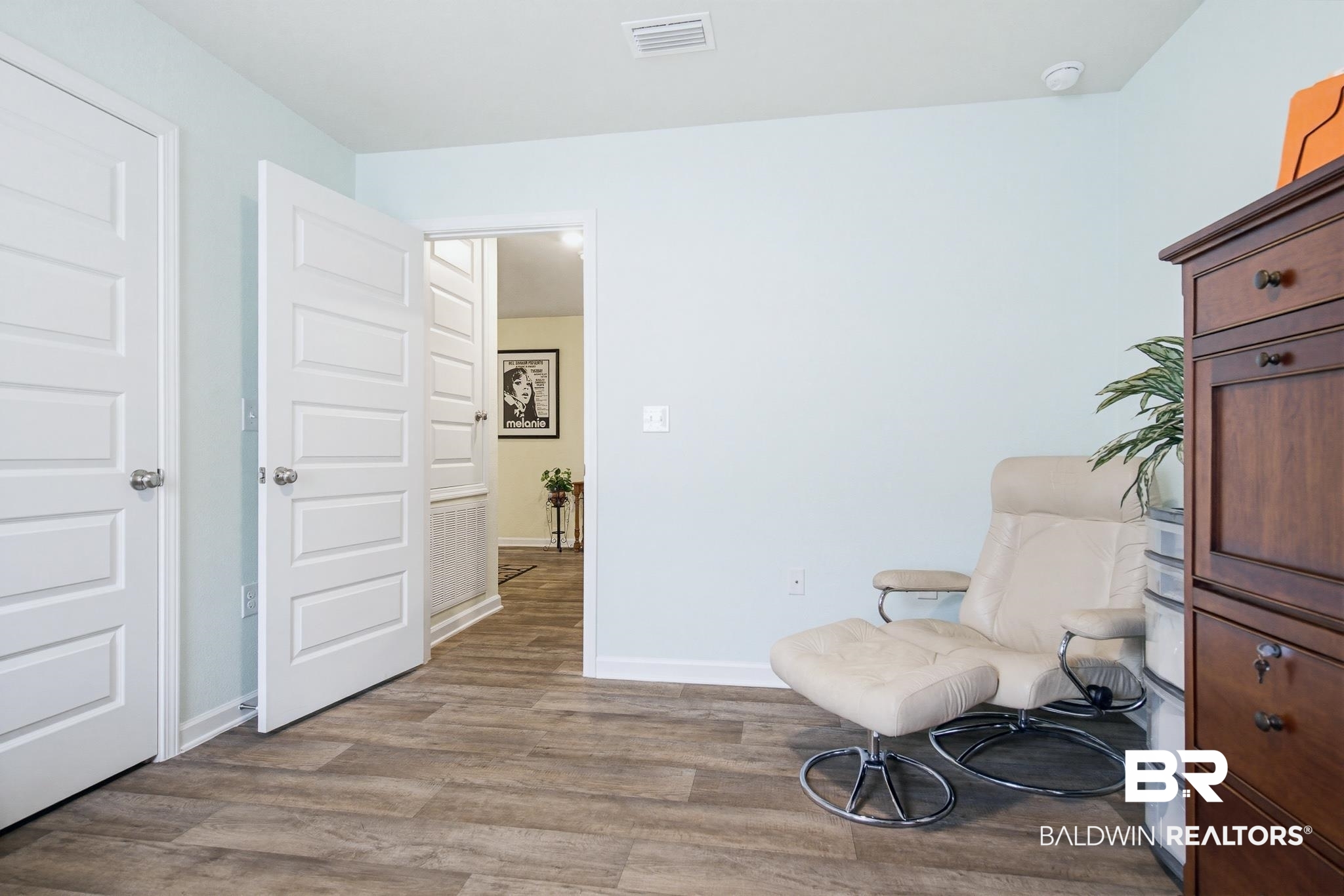 261 Fulham Lane Foley, AL 36535 - Photo 20 of 50 Living area featuring dark wood finished floors and baseboards