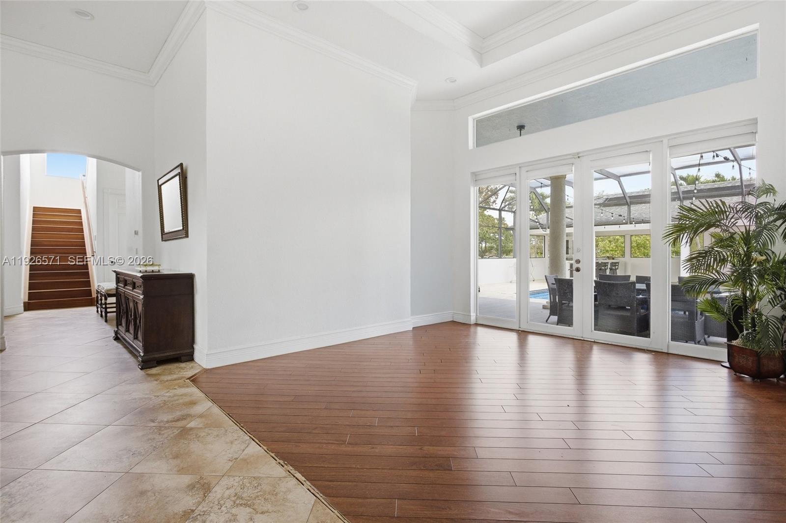 20401 Southwest 48th Place Southwest Ranches, FL 33332 - Photo 28 of 55 a view of an entryway with wooden floors