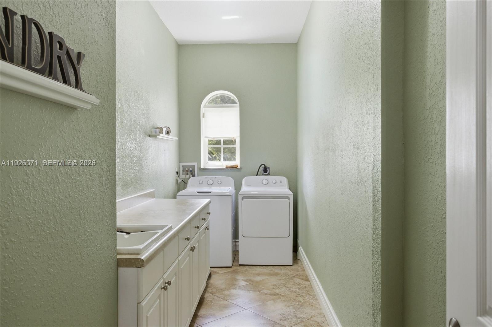 20401 Southwest 48th Place Southwest Ranches, FL 33332 - Photo 36 of 55 a bathroom with a granite countertop sink and a mirror