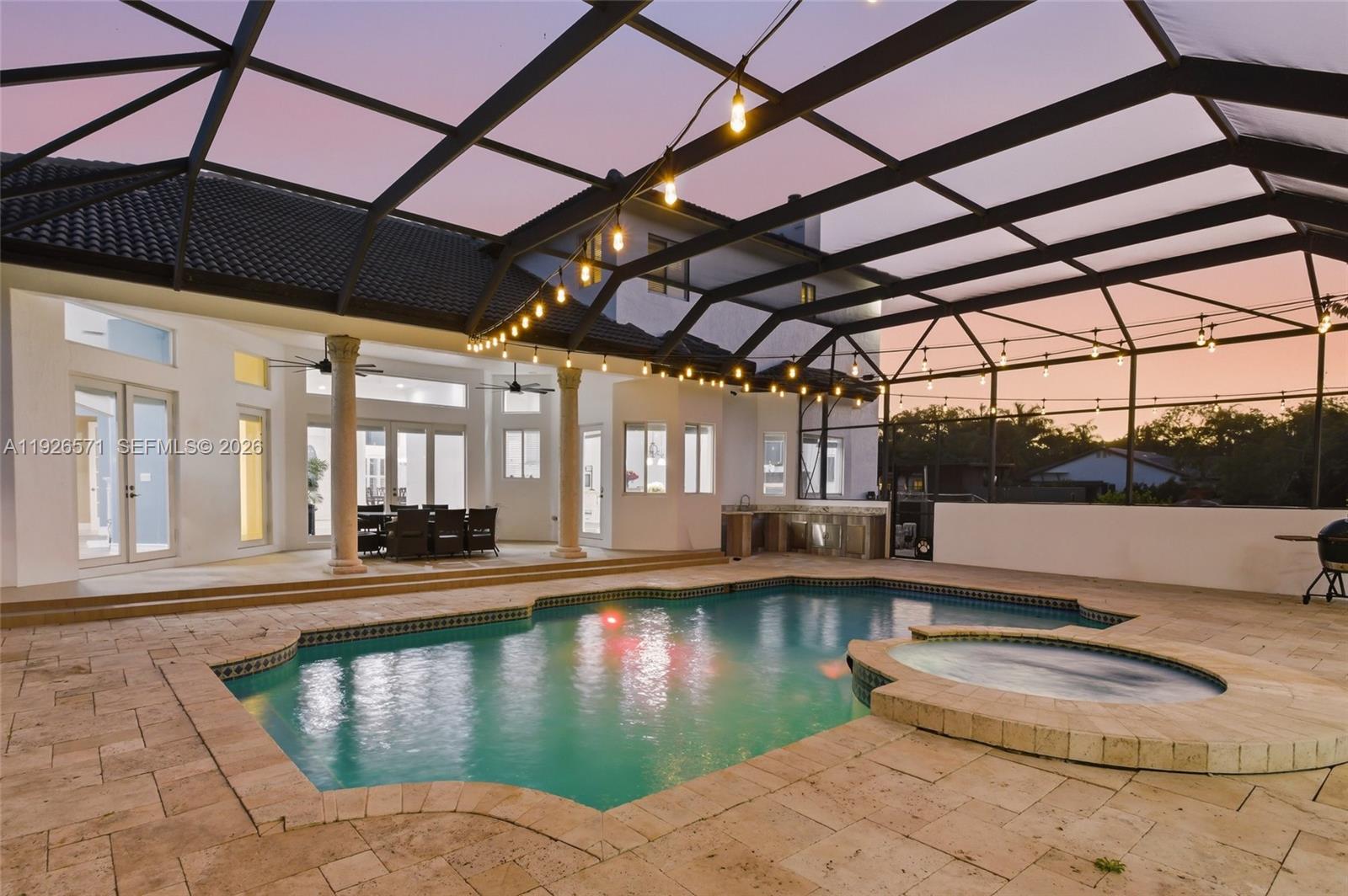 20401 Southwest 48th Place Southwest Ranches, FL 33332 - Photo 4 of 55 a view of a swimming pool with a porch