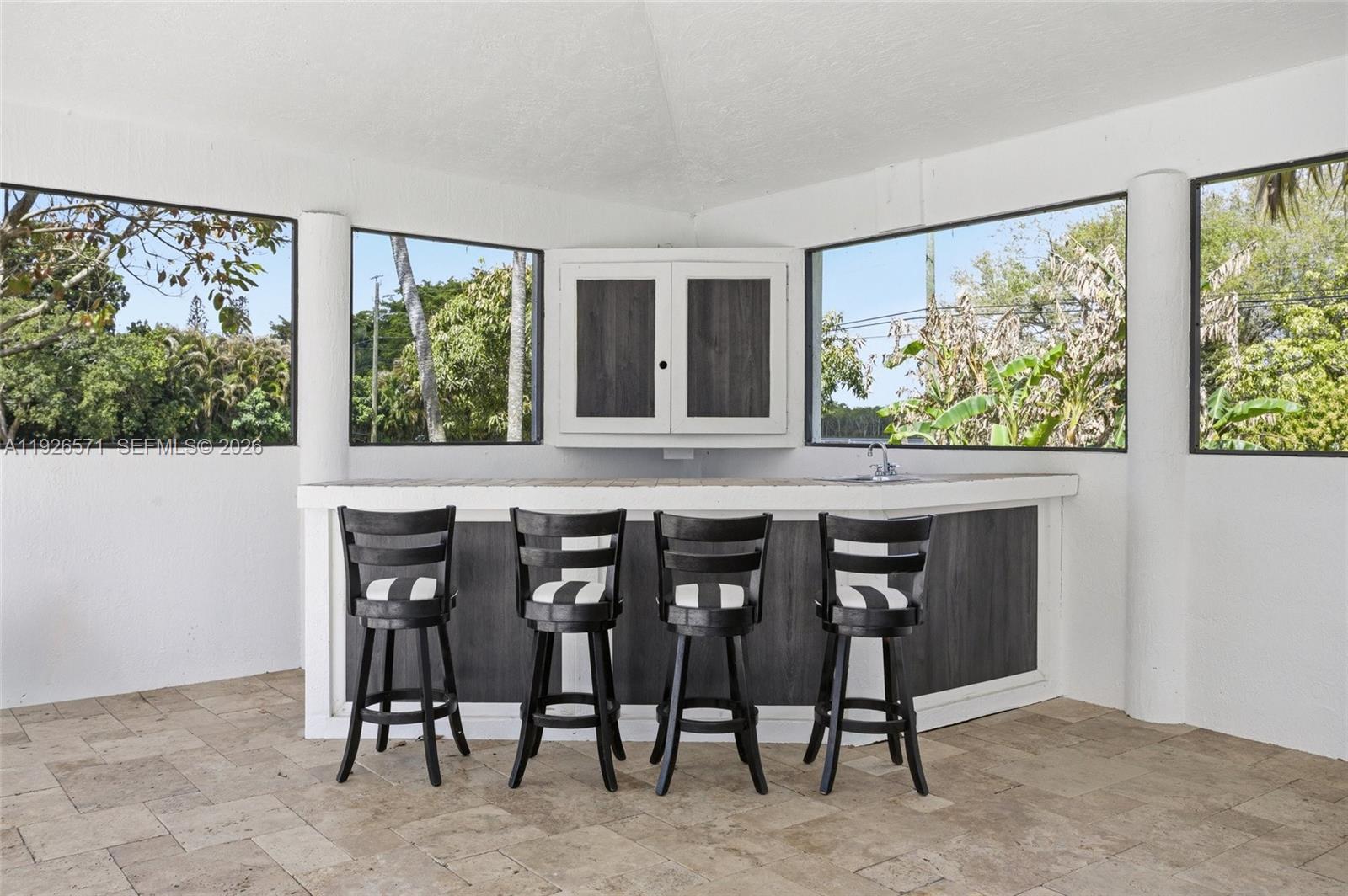 20401 Southwest 48th Place Southwest Ranches, FL 33332 - Photo 10 of 55 a dining room with furniture and window