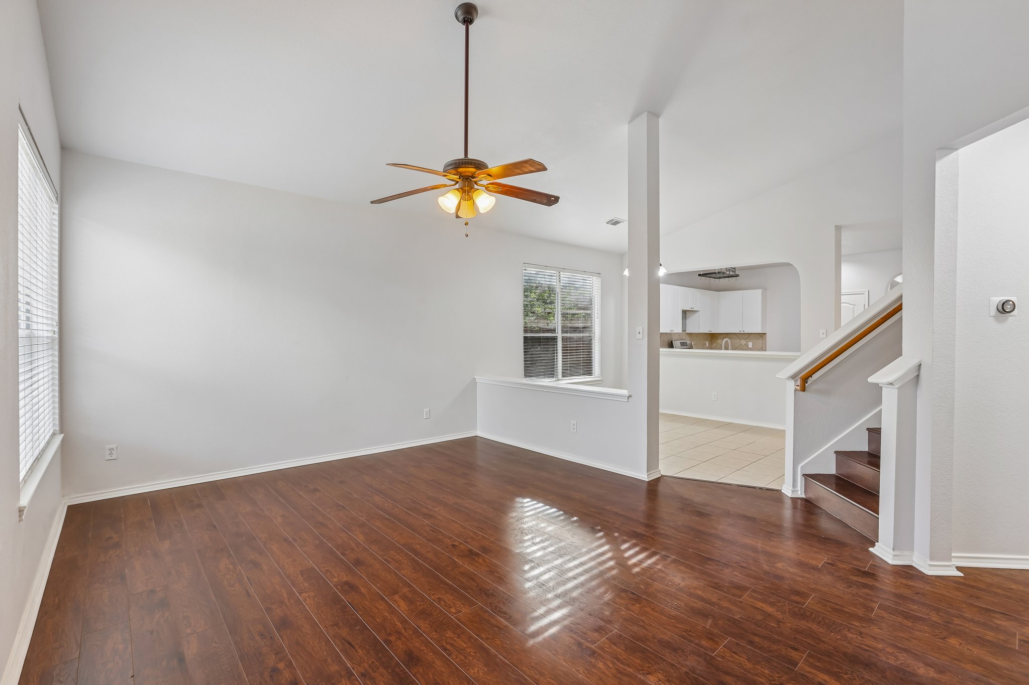 1721 Long Rifle Drive Austin, TX 78754 - Photo 18 of 38 Rich hardwood floors welcome you into this generously proportioned living space.
