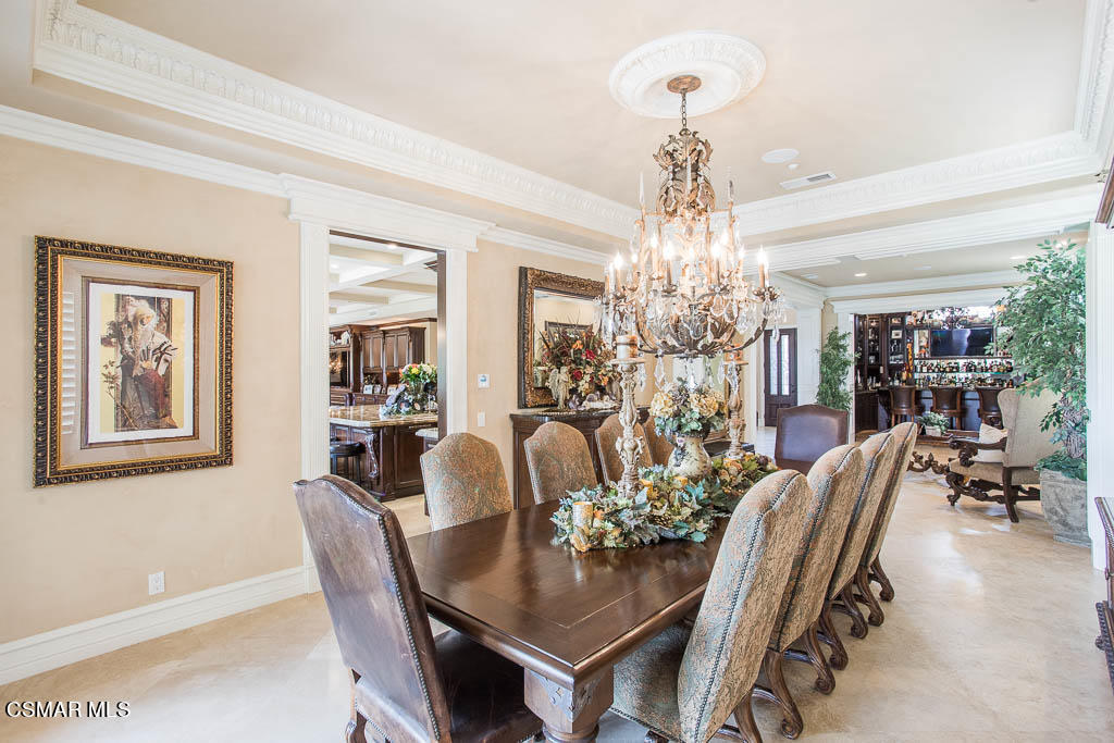 12406 Nelson Road Moorpark, CA 93021 - Photo 11 of 74 a view of a dining room with furniture and chandelier