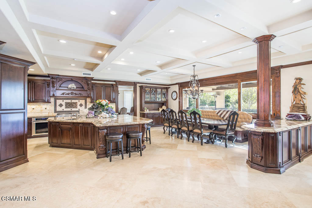 12406 Nelson Road Moorpark, CA 93021 - Photo 16 of 74 a view of a dining room with furniture window and outdoor kitchen