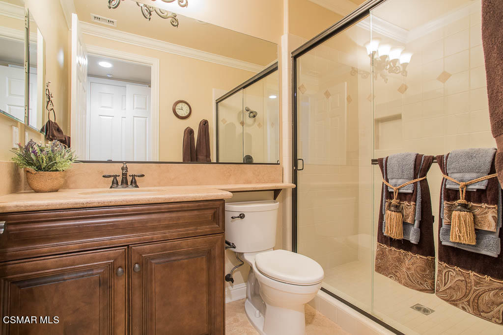 12406 Nelson Road Moorpark, CA 93021 - Photo 26 of 74 a bathroom with a sink a toilet and shower