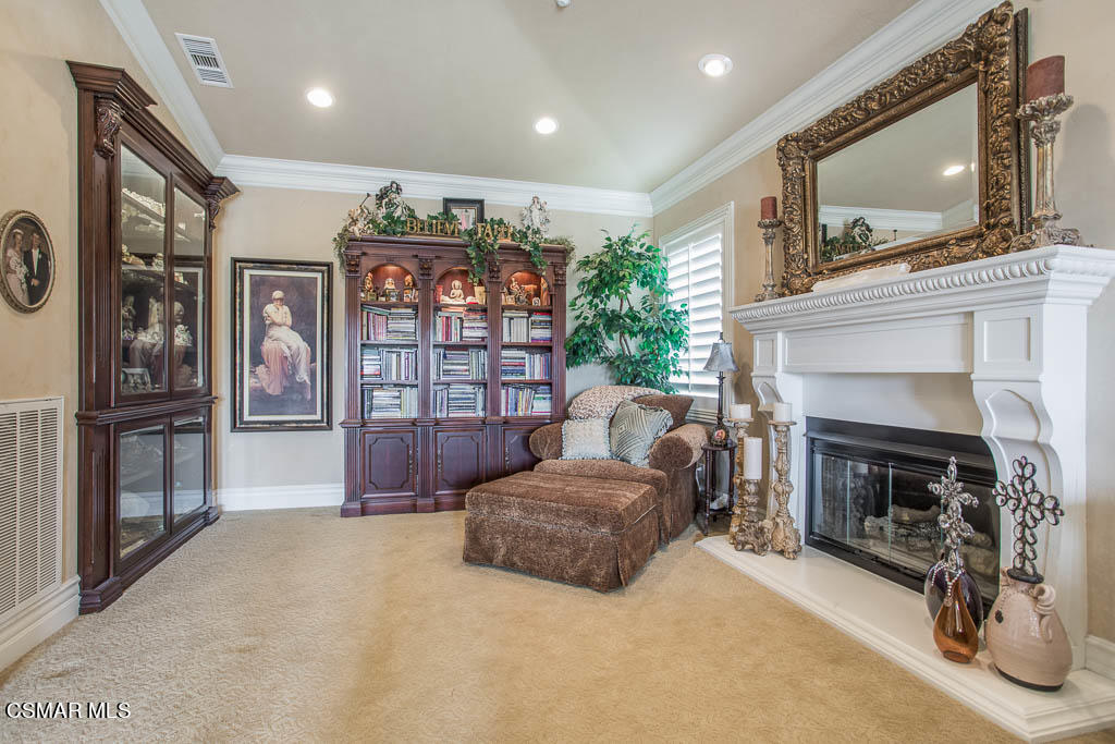 12406 Nelson Road Moorpark, CA 93021 - Photo 31 of 74 a living room with furniture and a fireplace