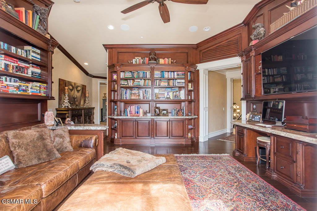 12406 Nelson Road Moorpark, CA 93021 - Photo 38 of 74 a living room with furniture and a fireplace