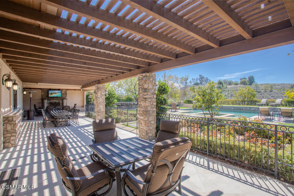 12406 Nelson Road Moorpark, CA 93021 - Photo 46 of 74 a view of a patio with swimming pool