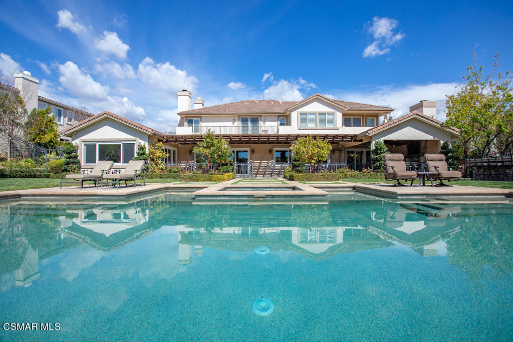 12406 Nelson Road Moorpark, CA 93021 - Photo 55 of 74 a swimming pool view with a seating space and a garden view