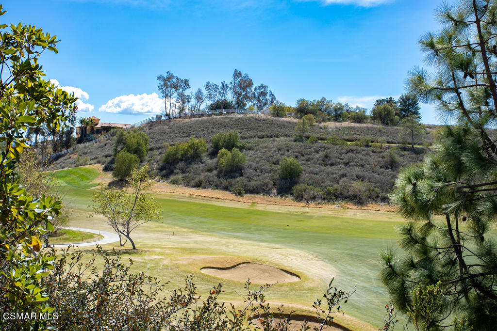 12406 Nelson Road Moorpark, CA 93021 - Photo 57 of 74 a view of a swimming pool with a yard