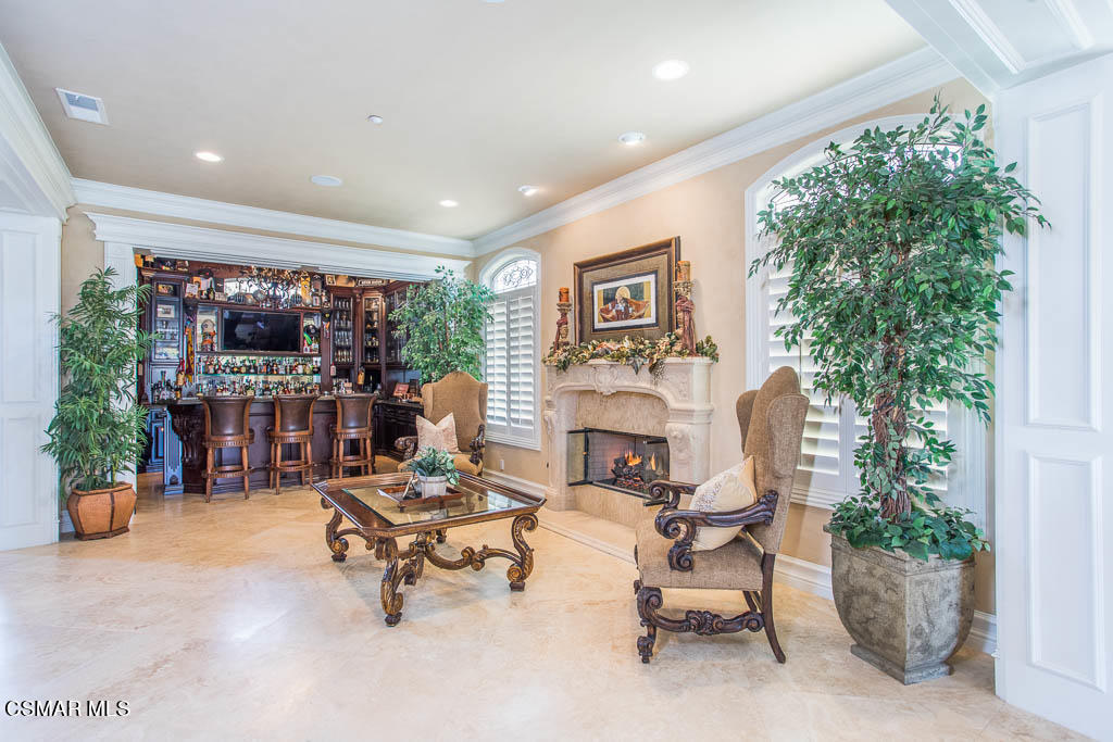 12406 Nelson Road Moorpark, CA 93021 - Photo 7 of 74 a living room with furniture and potted plants