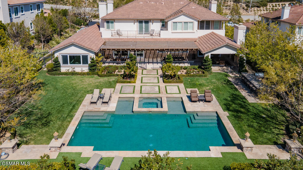 12406 Nelson Road Moorpark, CA 93021 - Photo 65 of 74 a view of a house with a yard
