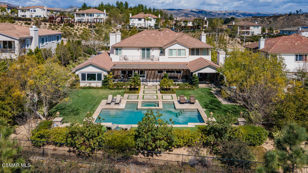 12406 Nelson Road Moorpark, CA 93021 - Photo 66 of 74 an aerial view of a house with a yard and lake view