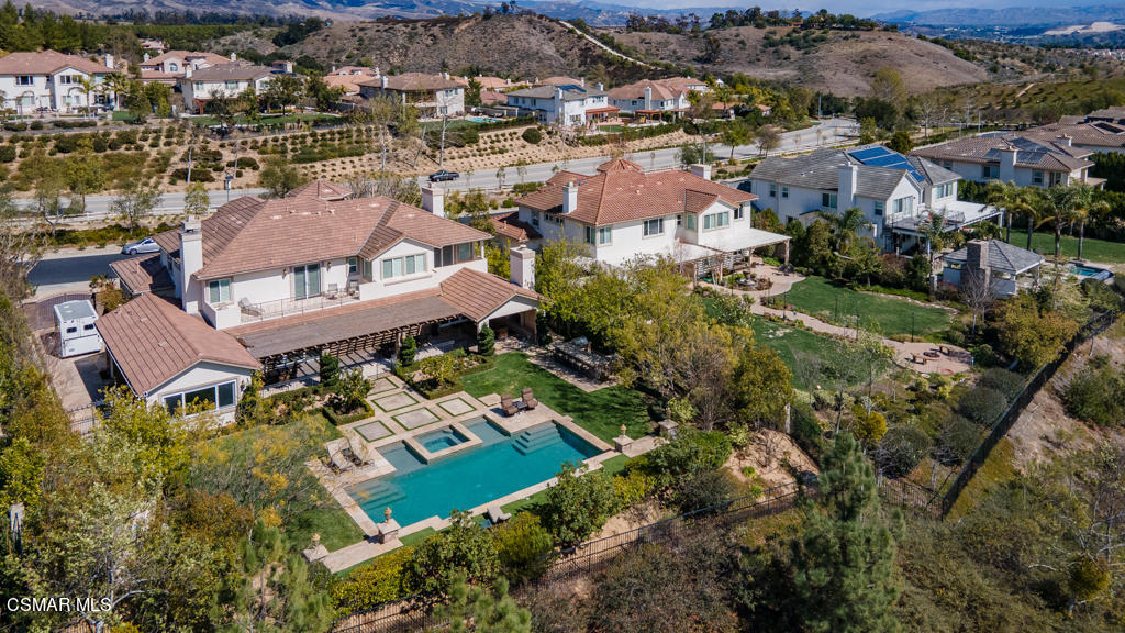 12406 Nelson Road Moorpark, CA 93021 - Photo 67 of 74 an aerial view of residential houses with outdoor space